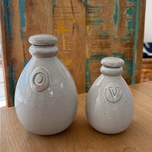 Crate and barrel oil and vinegar ceramic cruet set. Oatmeal glaze.